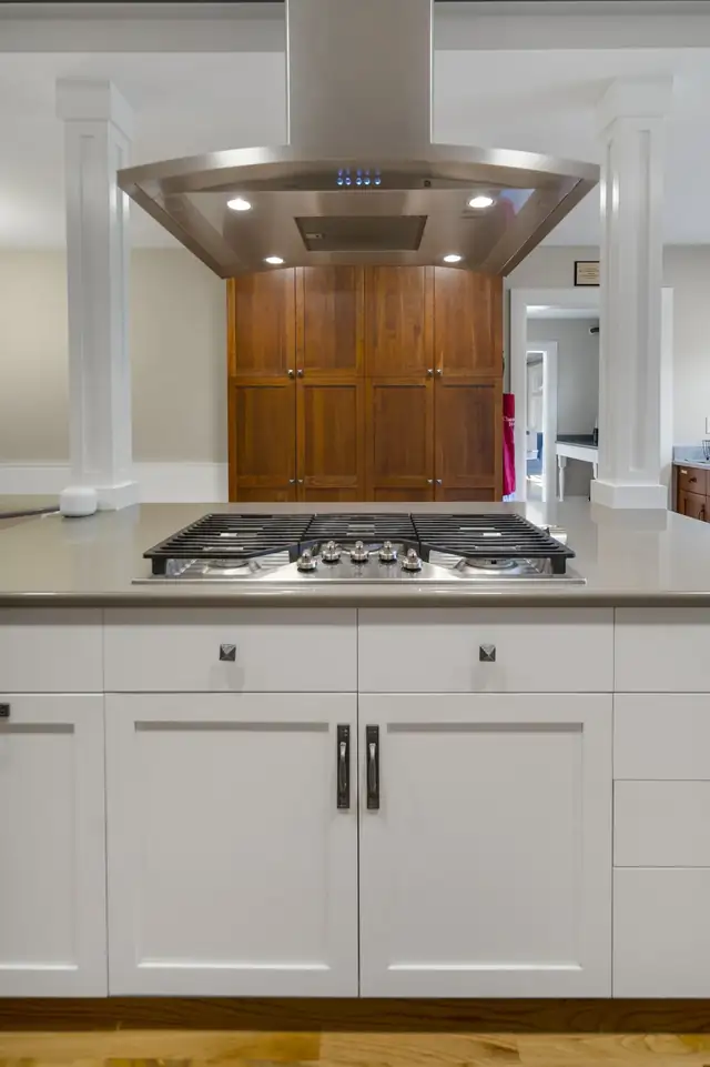 Cooktop and stainless island hood in the Sophia House kitchen remodel in Ithaca, NY